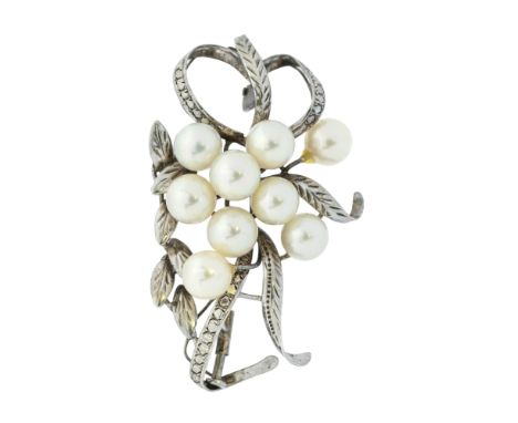 A cultured pearl white metal spray brooch, length approx 50mm, pin and roller clasp, stamped 9ct? total gross weight approx 1