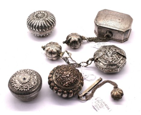 Three 19th/early 20th century white metal/silver South Eastern Asian betel boxes with lime pots together with two other silve