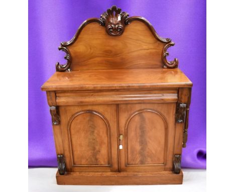 A Victorian chiffonier in mahogany