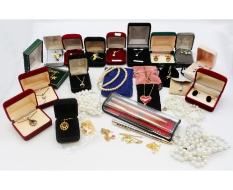 A large collection of costume jewellery to include six silver cz set pendants, silver onyx pendant, white metal pendants,  to