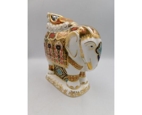 A Royal Crown Derby Large imari Elephant paperweight , approximate height 21cm, silver stopper in good condition with no chip