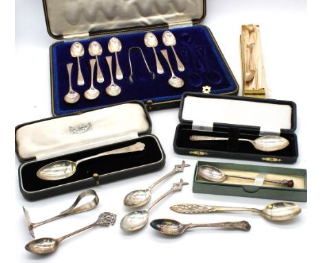 A cased part set of nine Edwardian silver teaspoons, and sugar tongs, hallmarked by Joseph Rodgers & Sons, Sheffield, 1906; a