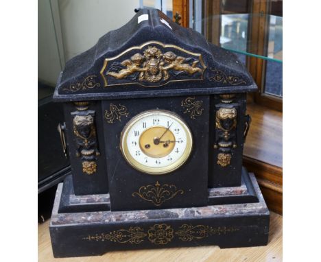 A large late 19th Century French 8 day slate mantle clock with Neo classical detail.