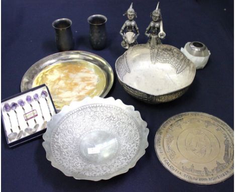 A small collection of white metal and silver plate to include; a white metal footed bowl with repousse foliate design, marked