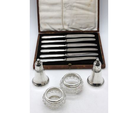 A small collection of silver to include; a pair of American Sterling silver (weighted) salt and pepper pots, each approx. 7.8