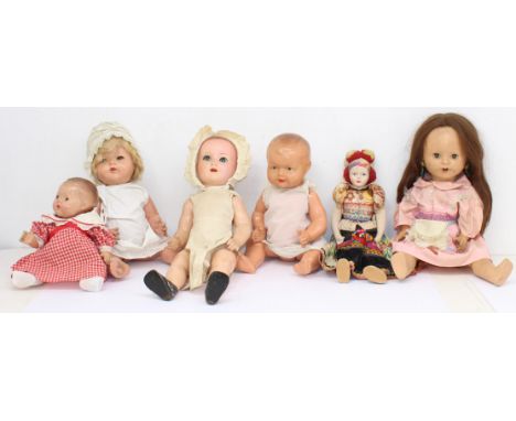  Dolls: A collection of six assorted composition dolls to include: K&W, and various other unmarked / indistinctly marked exam