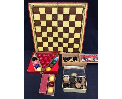 A mid 20th Century chess/drafts board with drafts and boxwood chess pieces along with a set of boxed mid 20th Century snooker