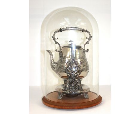 A silver plated Victorian tilting kettle on heat stand, ornately etched with foliage decoration and detail, with inscription 