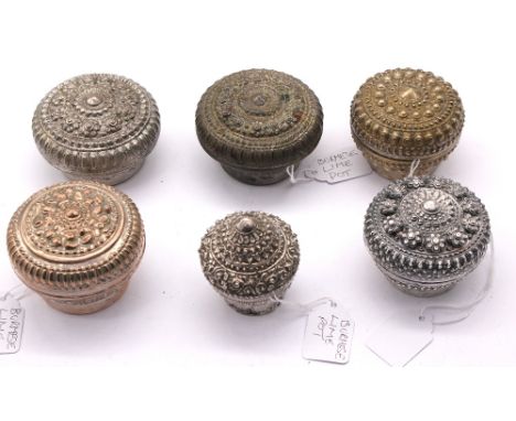 Assortment of six various 19th/early 20th century white metal/silver lidded South East Asian lidded betel boxes, each with sc