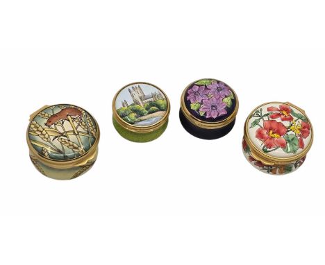 A group of four Moorcroft Enamel pill boxes. 1. Worcester cathedral signed JB - Jayne Bishop. Waisted circular form with scre
