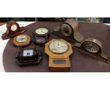A collection of early to mid 20th Century wall clocks, mantle clocks and Napoleon hat clocks along with an early 20th Century