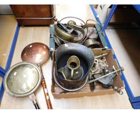 A collection of 19th Century brass and copper wares to include bed pans, fender, candlesticks, kettles, coal scuttles, fire i