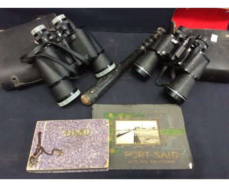 Two cased pairs of mid to late 20th Century binoculars, mid 20th Century police truncheon, early 20th Century souvenir of Por