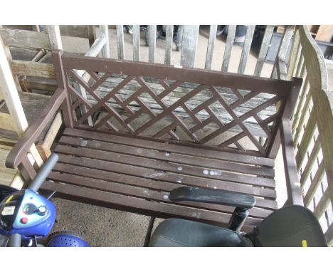 A painted garden two seater bench with patterned back rest