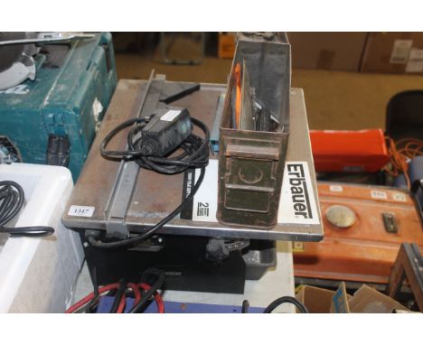 An Erbauer R07W18 electric tile cutter with instruction guide and accessories 