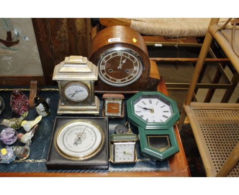 A quantity of clocks, a barometer and an eight day movement mantle clock