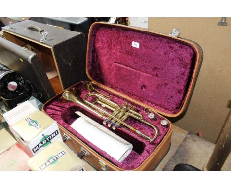 A Zenith brass trumpet in fitted case