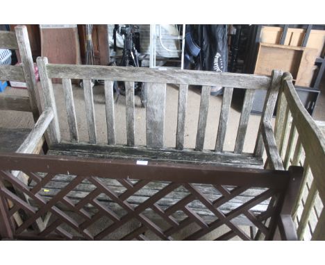 A hardwood garden two seater bench 