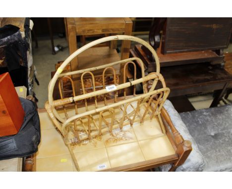 A vintage cane magazine rack