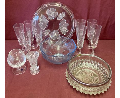 A box of assorted vintage glassware items.  To include a set of 8 cut glass stemmed champagne glasses and a cake plate with b