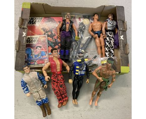 A box of assorted Action Man dolls, toys and accessories.  To include: books, DVD, Crime Buster Security pack and 7 dolls to 