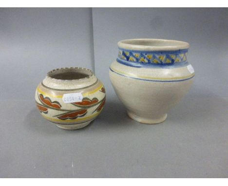 Poole Pottery small vase decorated in the oak leaf pattern c1924-34 and a Poole Pottery geometric painted vase