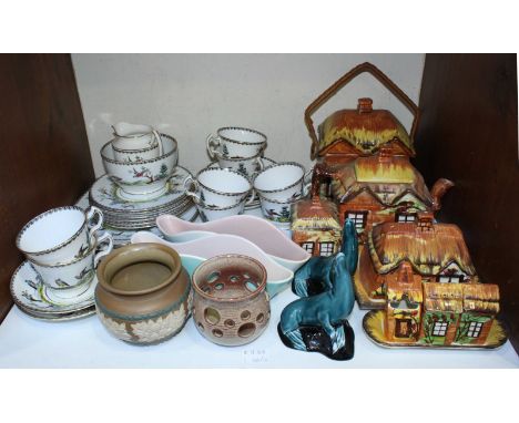 SECTION 11. A Royal Stafford part tea and coffee set with exotic bird scenes, together with a Cottage Ware biscuit barrel and