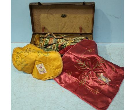 Two WWII satin-embroidered pillow cases worked with Regimental badges, together with a quantity of silk scarfs, linen, Egypti