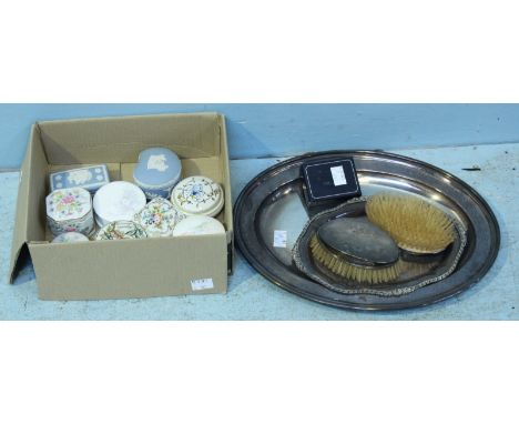 A small mixed lot comprising of a silver-plated oval tray, a smaller tray, two brushes and a silver ingot, together with nine