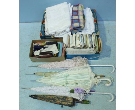 Assorted textiles, lace, crocheted blankets, patchwork quilt, silk scarves, fan, vintage dress patterns and assorted parasols