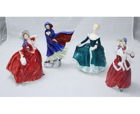 Four Royal Doulton ceramic figures of ladies including 'Autumn Breezes HN.1934,' 'Christmas Morn HN.1992,' 'May HN.2746' and 