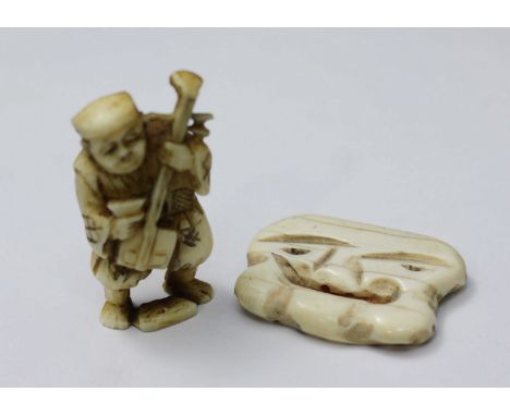 A Japanese carved ivory Netsuke of a musician playing a Shamisen, signed underside, 50mm high, together with another Netsuke 