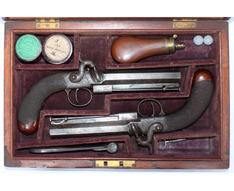 A good quality pair of 19th century single-shot percussion pistols by Berry, with .65 Cal 5-inch octagonal barrels each engra