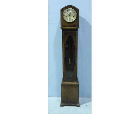 An oak cased shortcase clock by J. Smith & Sons of Derby, the silvered dial with Arabic numerals denoting hours, the trunk wi