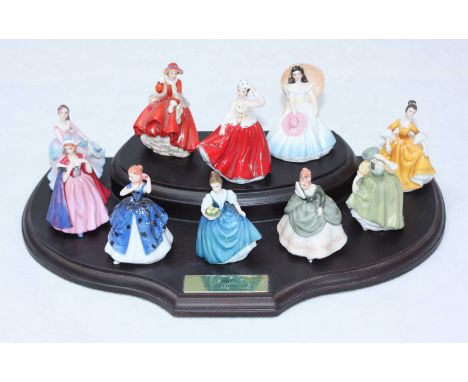 Ten assorted Royal Doulton ceramic 'Miniature Ladies.' Nine in original boxes, together with display platform.