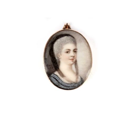 Adam Buck: an 18th Century miniature portrait of a woman, signed and dated 'A Buck 1778', painted on ivory, in gold mount eng