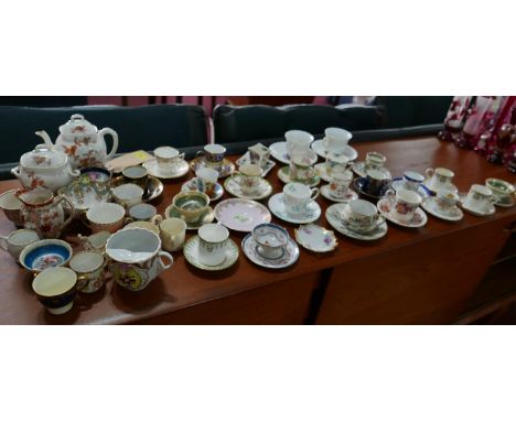 A collection of 19th &amp; 20th century porcelain cups and saucers 
