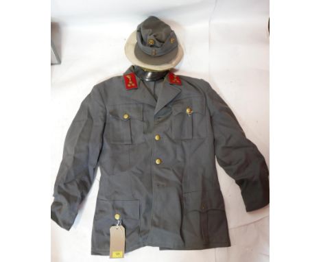A vintage Austrian army uniform, comprising trousers, jacket and cap, together with an Austrian army officers hat 