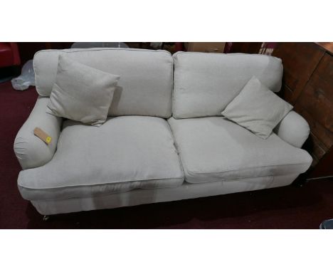 A contemporary two seater sofa 