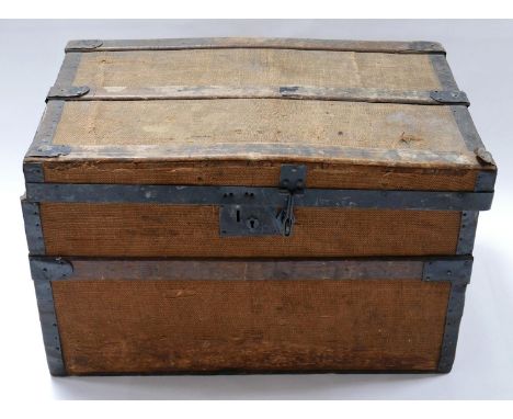 An antique iron bound and canvas trunk, H.42 W.71 D.43cm 