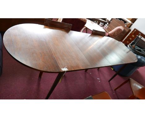 A mid 20th century N&amp;R Mobler Danish exotic hardwood D-end dining table, with 2 leaves, removable ends, raised on tapered