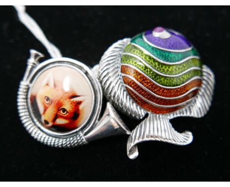 Two stering silver pendants/brooches, one in the form of a brightly-coloured angel fish with ruby eye, 4 x 4.5cm, other a sil