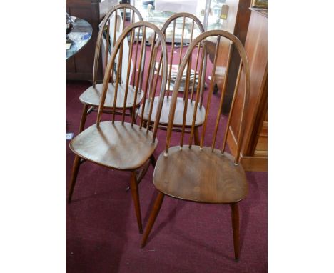 A set of four mid 20th century Ercol dining chairs 