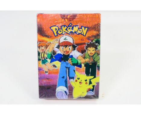 Pokémon - A factory sealed pack of Gold Foil Pokémon cards. This pack contains 55 cards and is still sealed in plastic cellop