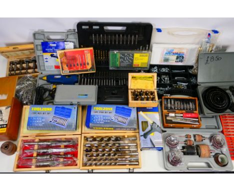 Lot to include various drill bit sets, hex bits, star bits, an organiser of nuts, door hinges and other. [W]