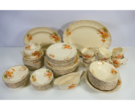 A collection of J & G Meakin table and tea wares decorated in the Sunshine pattern, approximately 80 pieces. [2]. [W]

NOTE: 