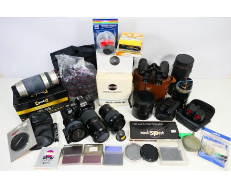 Photography - Lot to include a Minolta 7000, various lenses and accessories, cased binoculars and other. [W]