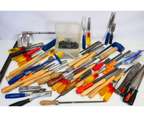 Various hand tools to include chisels, files, screwdrivers and similar. [W]