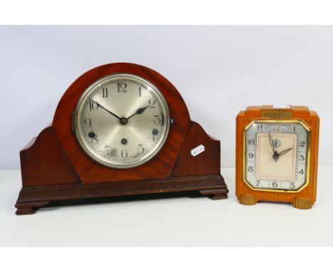 Two clocks to include an Art Deco Lux Clock Mfg Co Vendome clock and one other. [2]. [W]