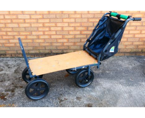 A Preston Innovations four wheeled fishing shuttle. [W]